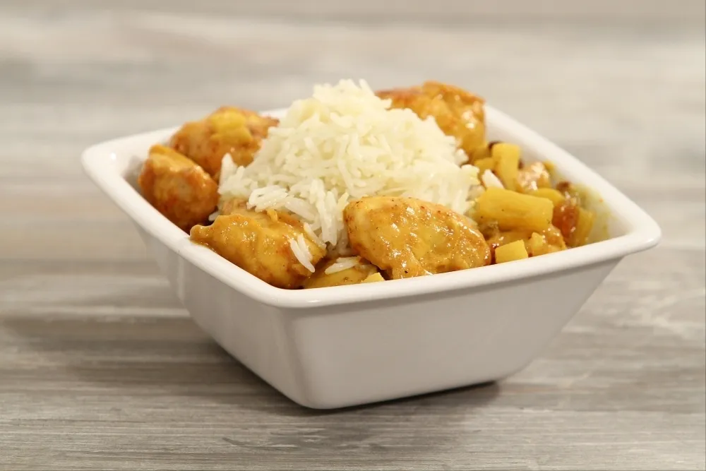 Image recette Curry de volaille à l'ananas, riz aux amandes