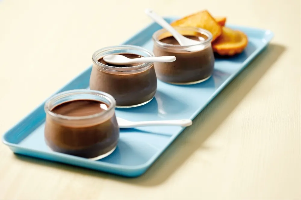 Petits pots de crème chocolat-cannelle et madeleines au miel