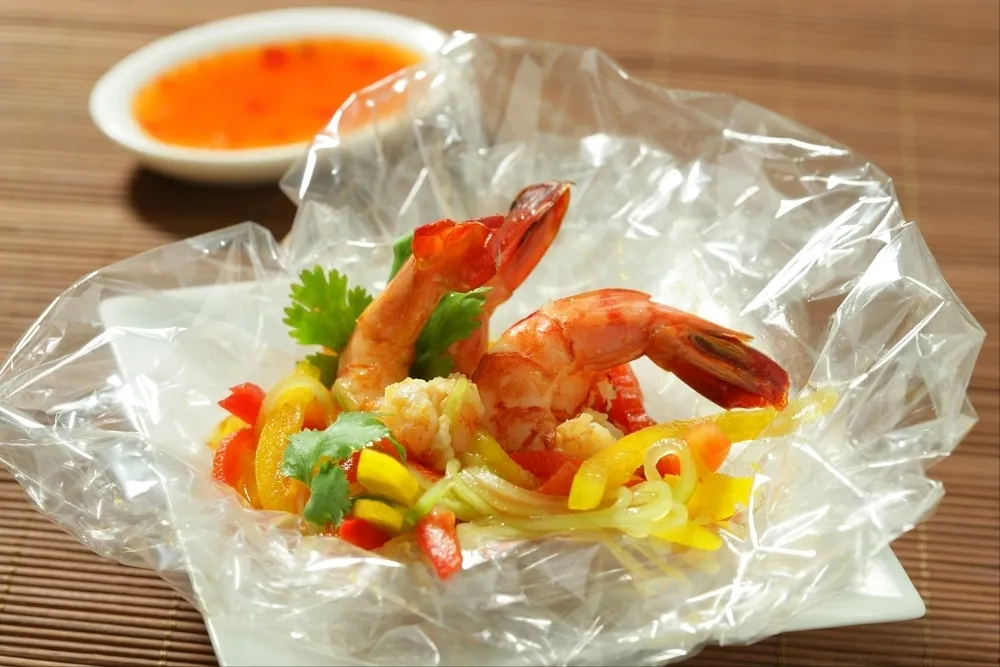 Image recette Papillote transparente de gambas et julienne de légumes thaï