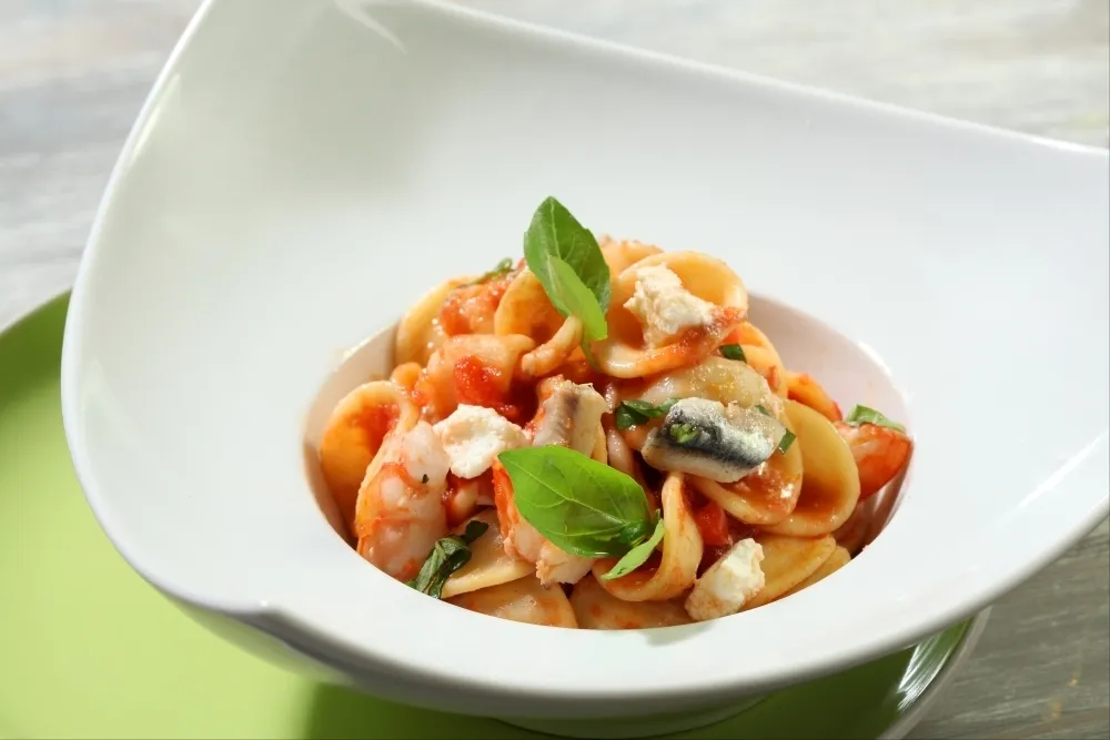 Image recette Orecchiette à la tomate et à la ricotta, anchois marinés et gambas