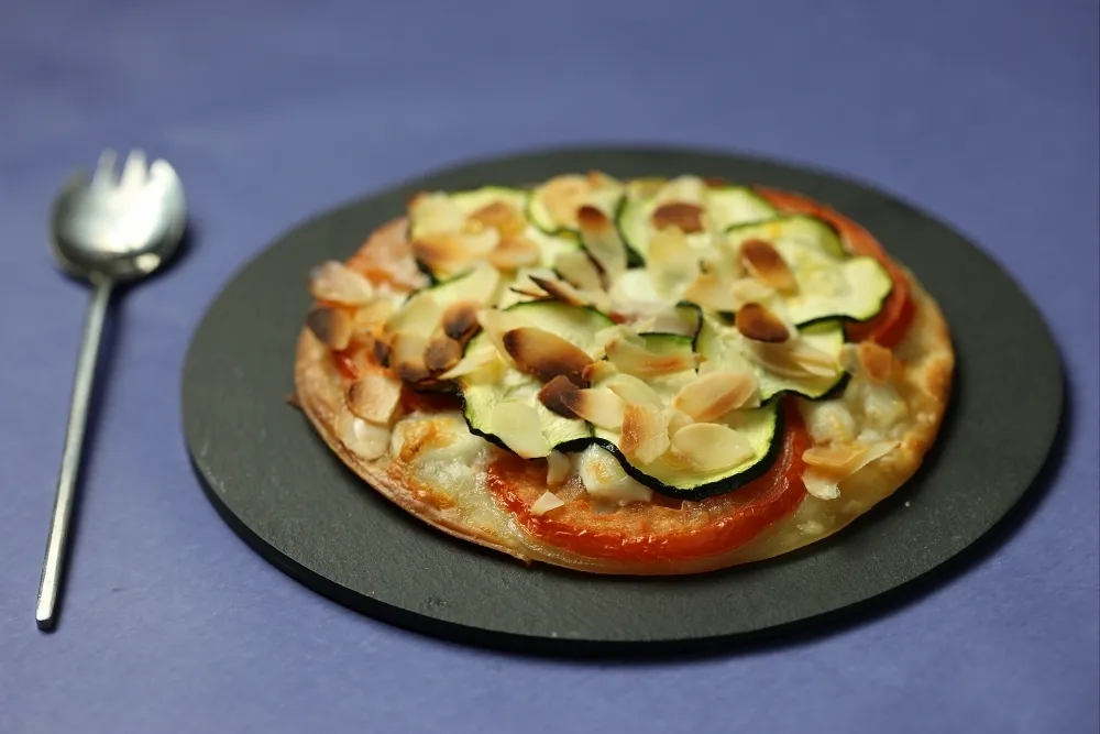 Image recette Pizza courgettes, mozzarella et amandes