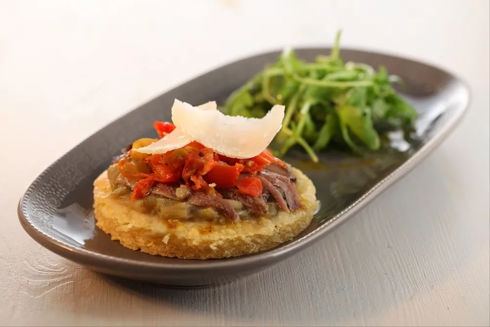 Image recette Tarte sablée au parmesan, compotée d'aubergines basilic et anchois