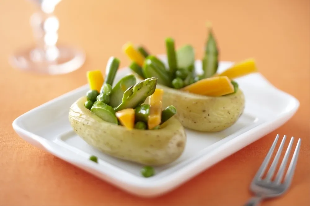 Image recette Pommes de terre garnies de petits légumes