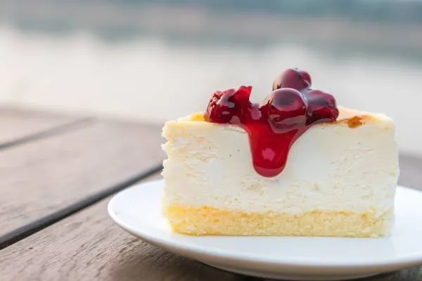 Image recette Cheesecake vanille et purée de fruits rouges