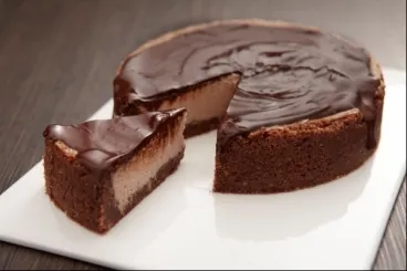 Image recette Cheesecake au cacao et zestes d'orange, nappage chocolat