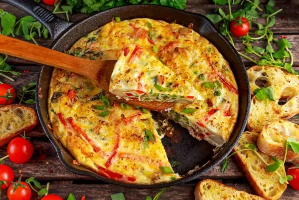 Image recette Tortilla, jambon et poivrons confits